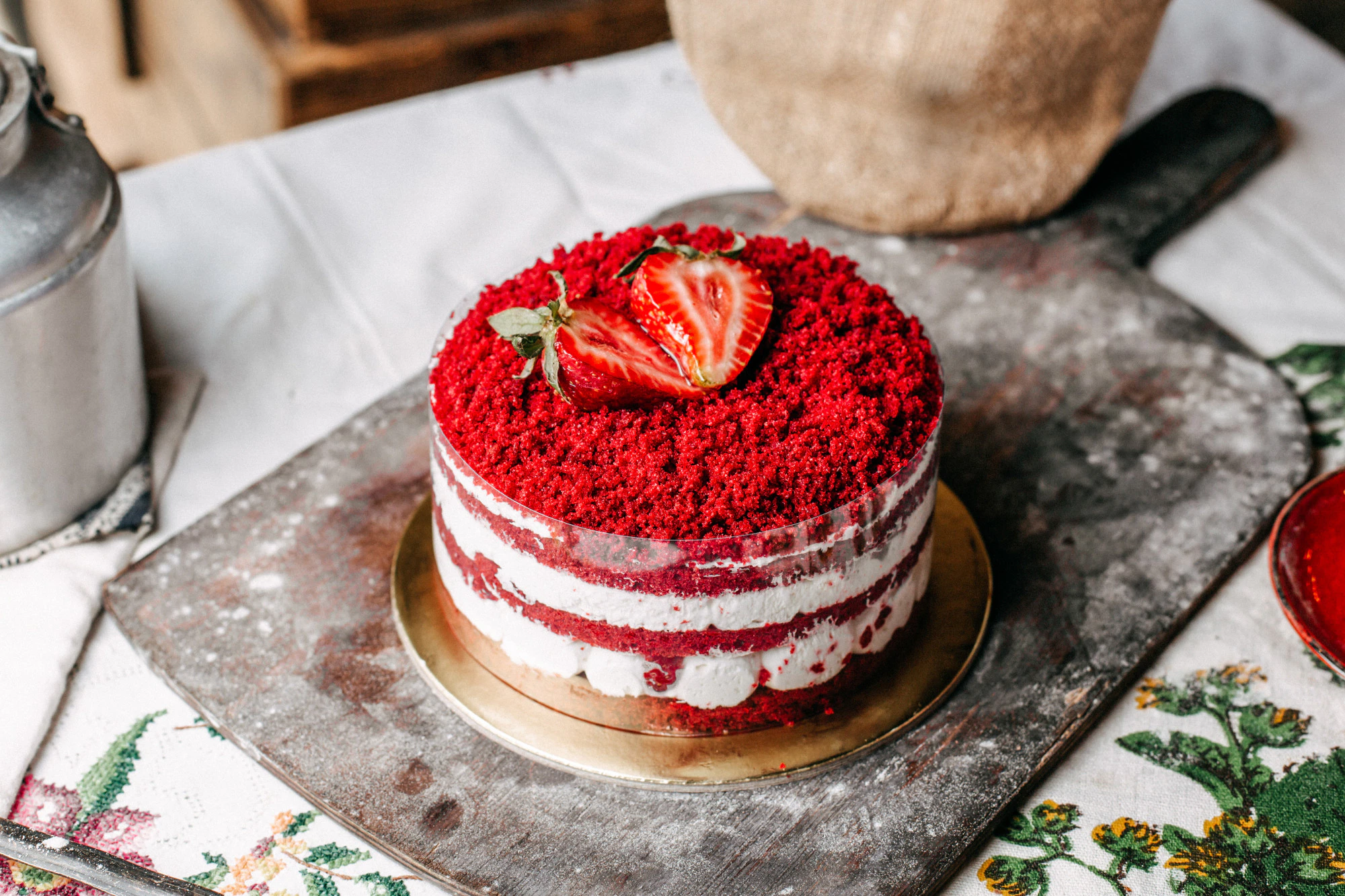 a-front-view-red-fruit-cake-decorated-with-strawberries-round-with-cream-delicious-sweet-birthday-celebration-on-the-brown-desk_140725-16092.jpg